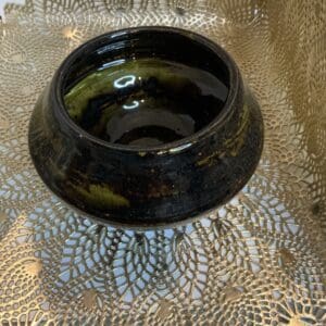 A bowl sitting on top of a table.