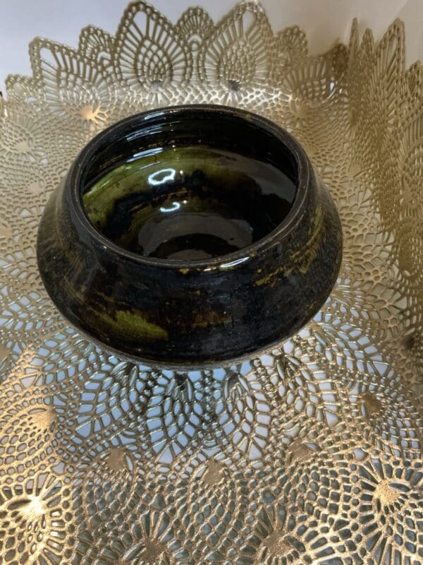 A bowl sitting on top of a table.