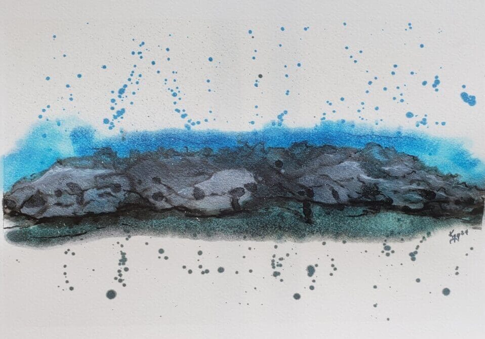 A painting of blue and black paint on the side of a wall.