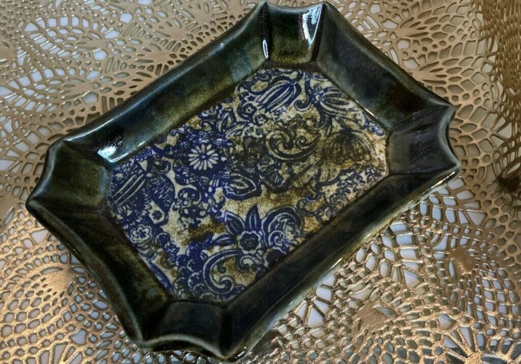 A small tray with a pattern on it